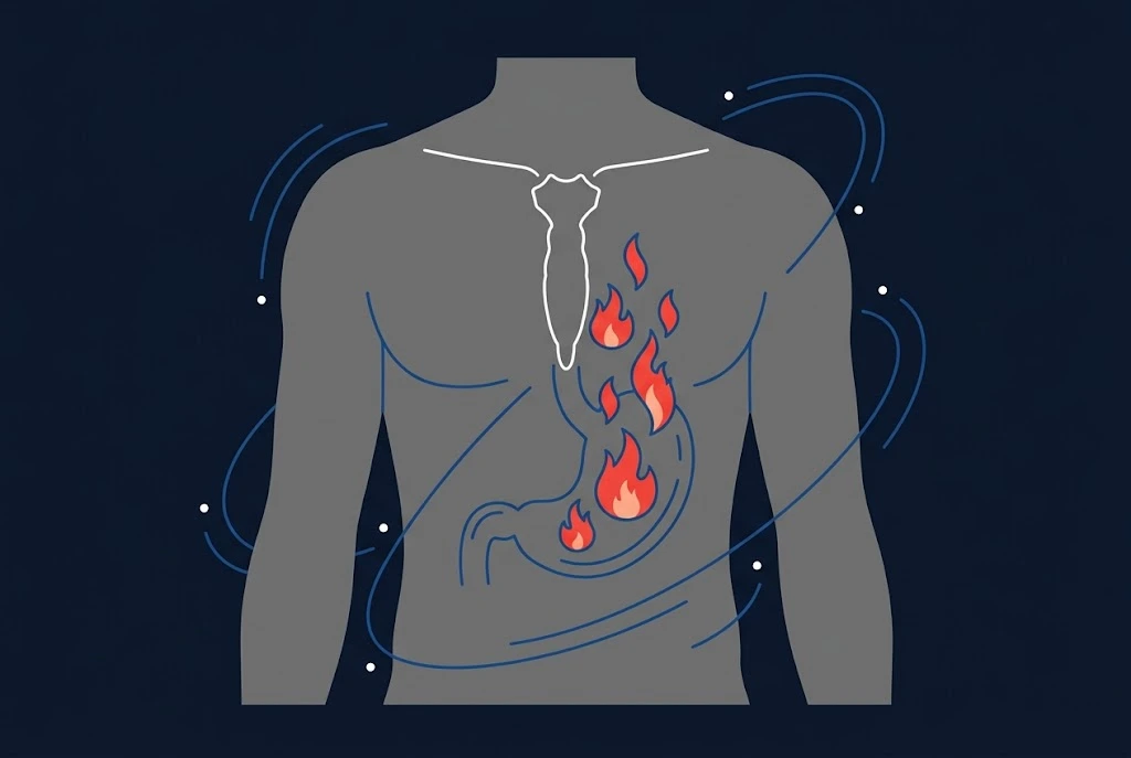 Silhouette of a torso with the stomach outlined and flames rising toward the chest, illustrating hyperacidity and heartburn